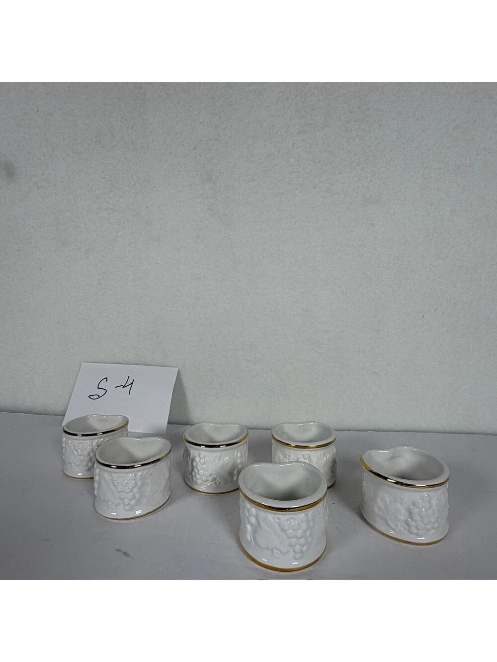 Set of 6 Vintage White Ceramic Napkin Rings Gold Trim Grapevine Embossed Design